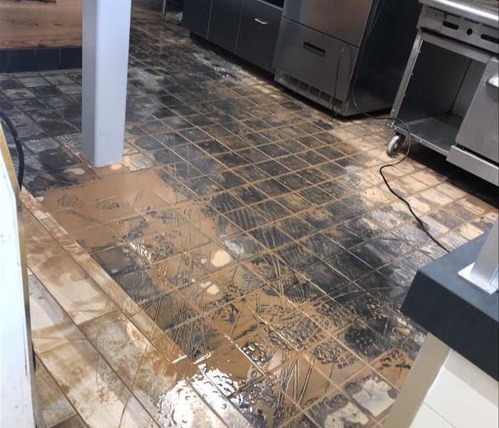 Water damage to kitchen floor